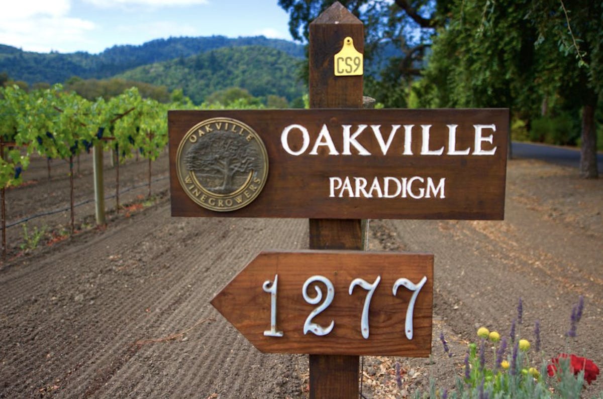 a sign on a wooden pole