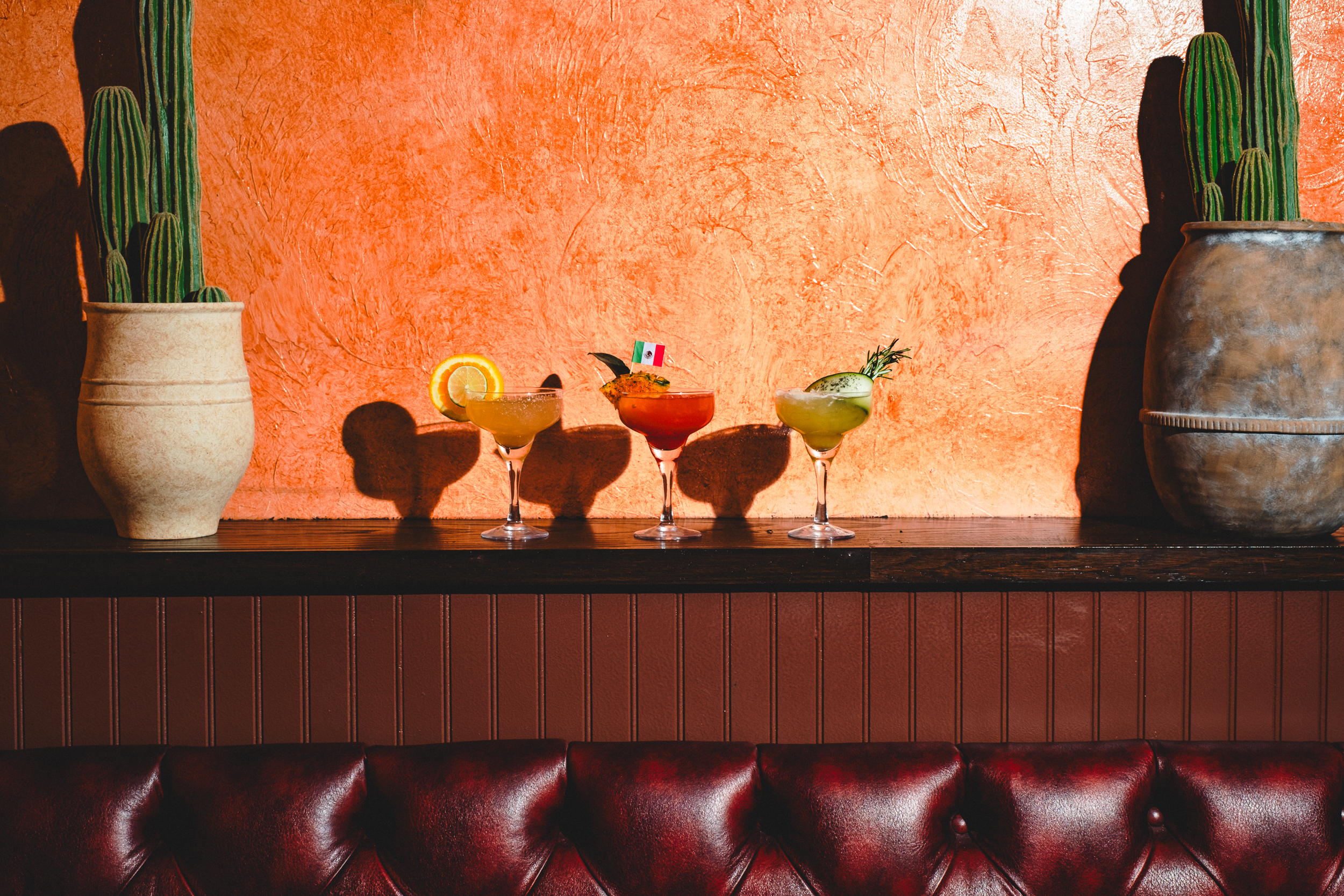 a row of drinks on a table