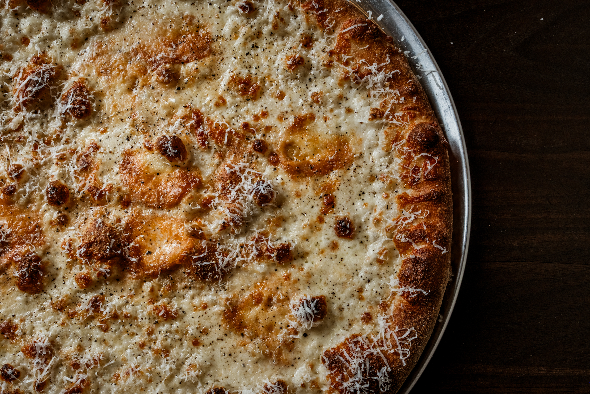 a pizza on  a dish