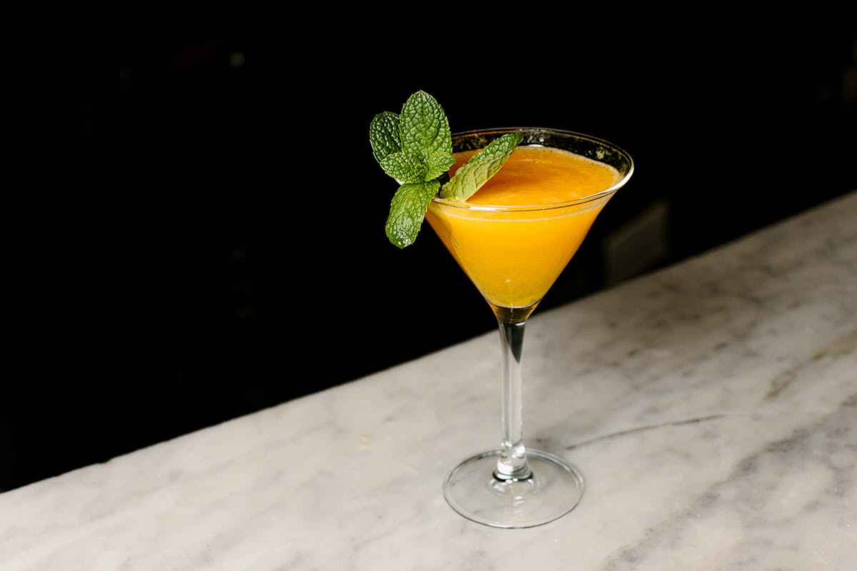 Mango martini with mint inside