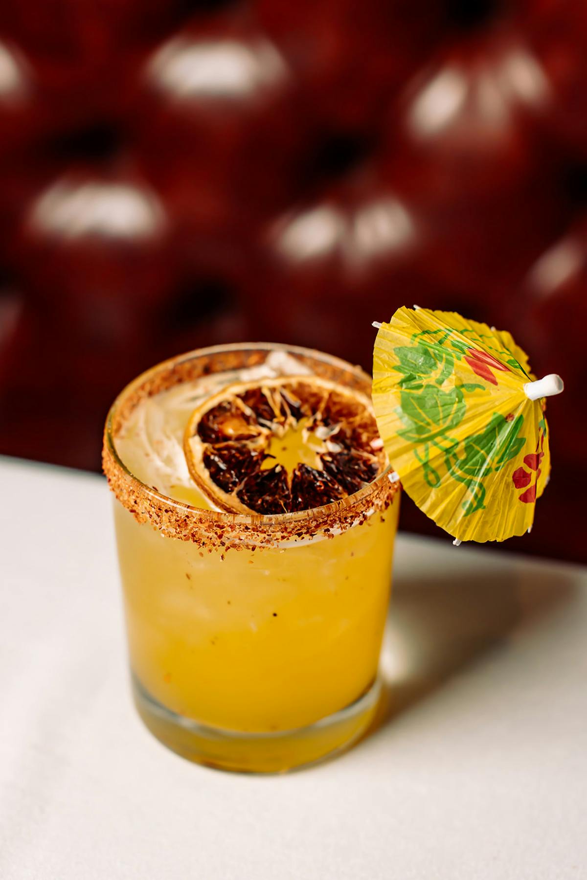 Mango Margerita with an umbrella in it