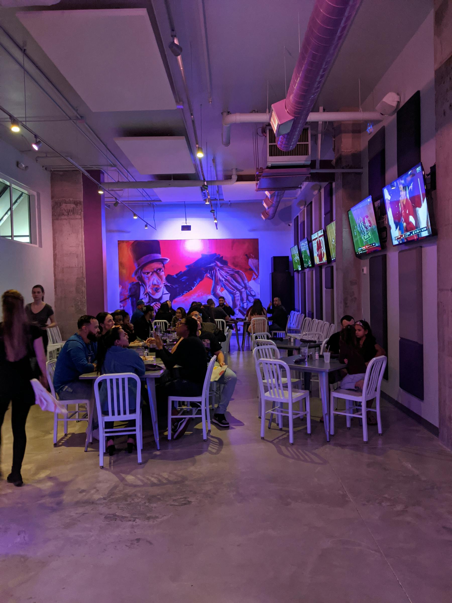 a group of people standing in a room