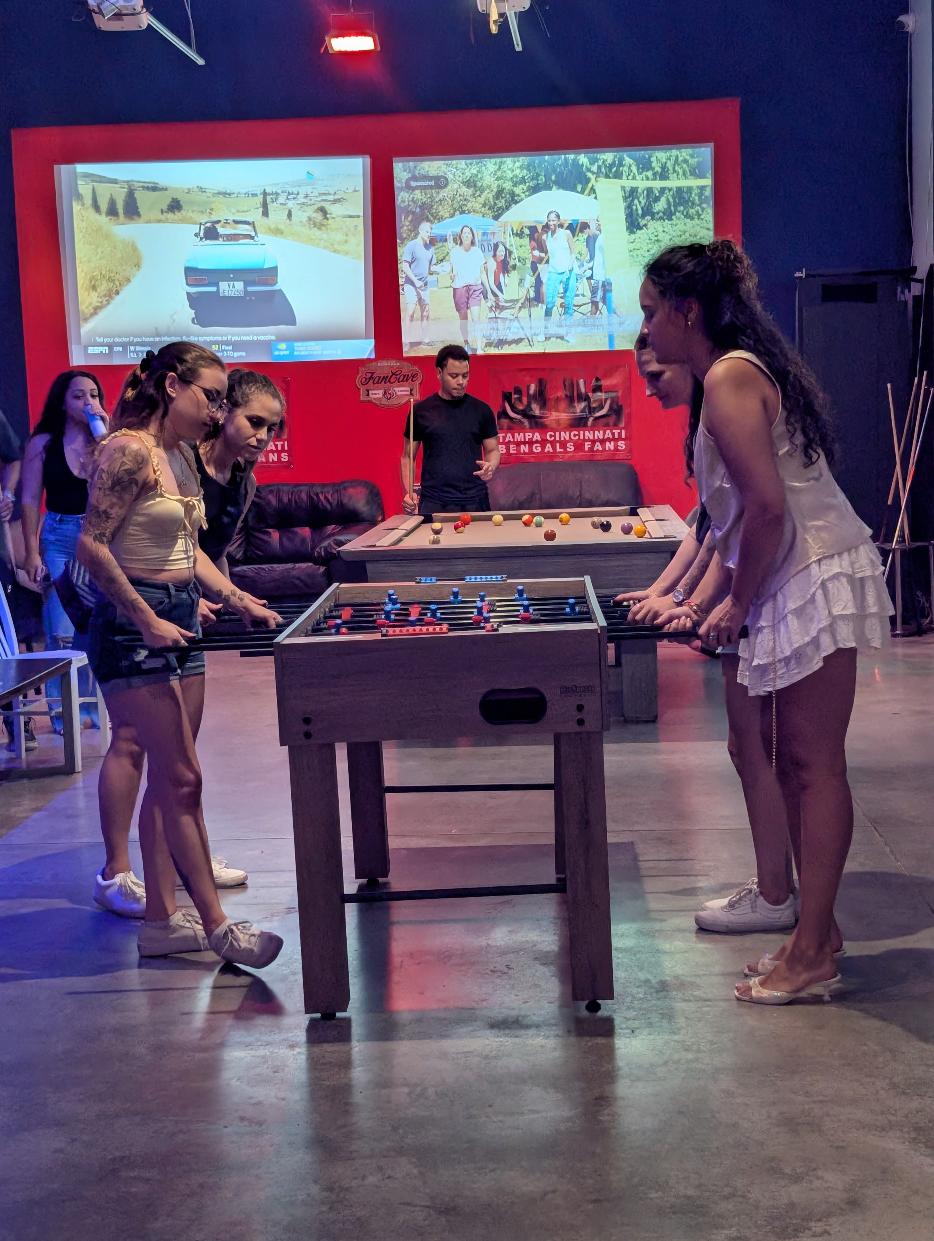 a group of people standing in a room
