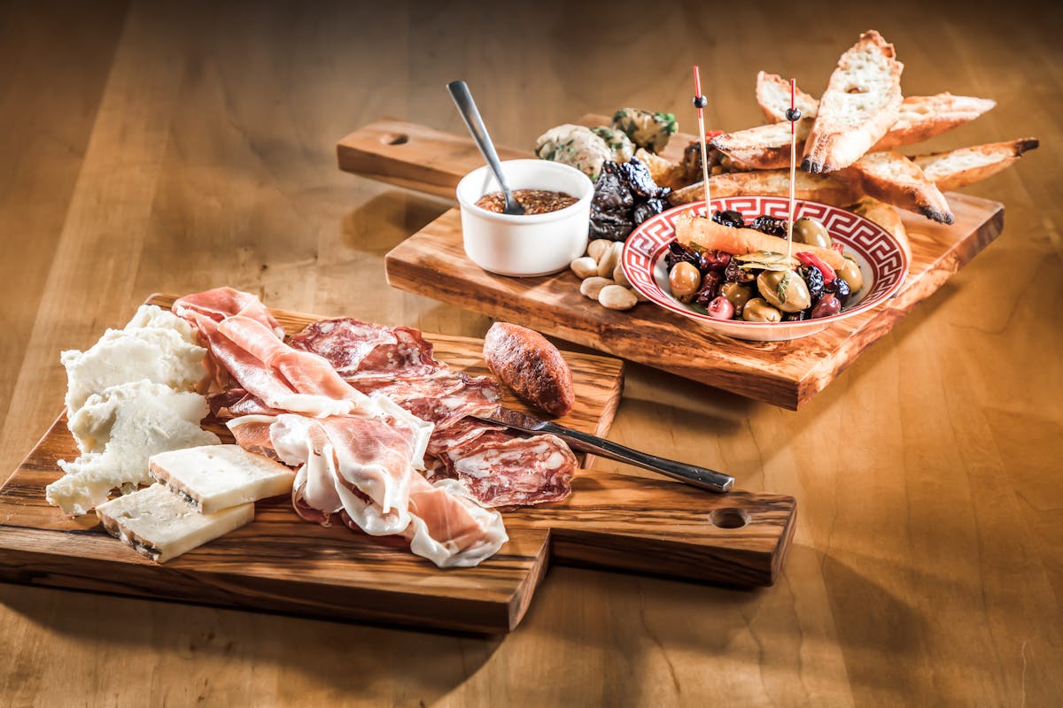 a tray of food on a wooden table