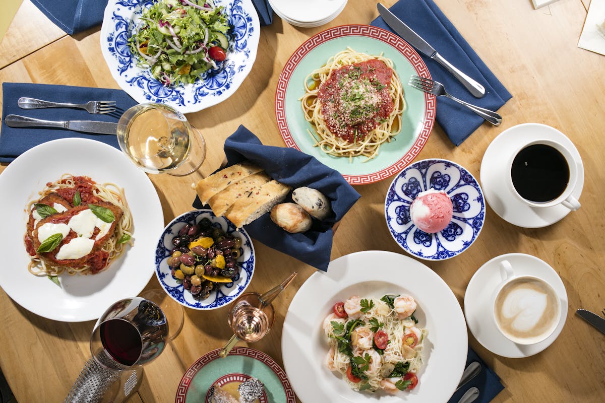 a bowl of food on a plate on a table