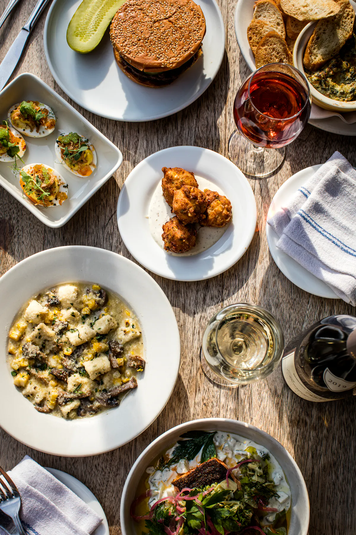 a bowl of food on a plate on a table