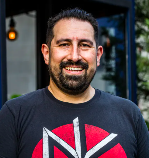 a man smiling for the camera