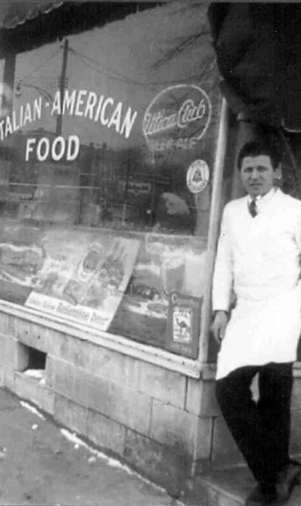 a person standing in front of a store