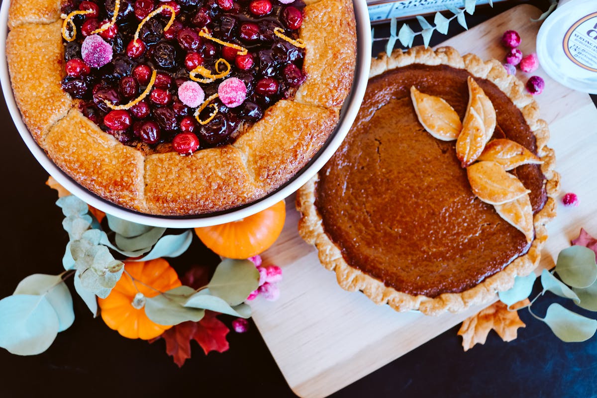 a plate of food with a slice of cake on a table