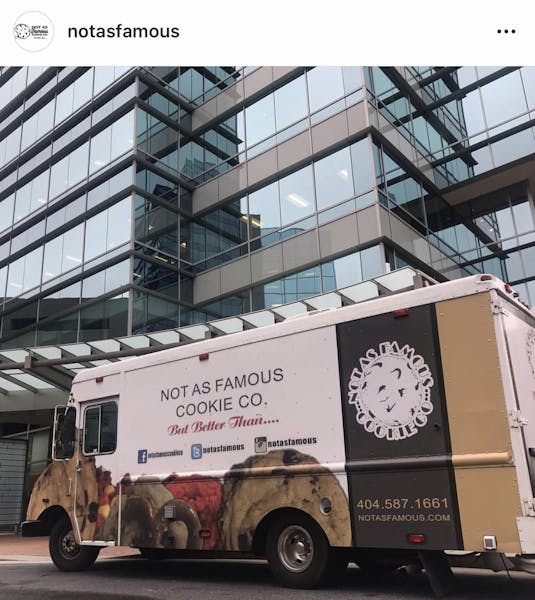 a truck is parked on the side of a building
