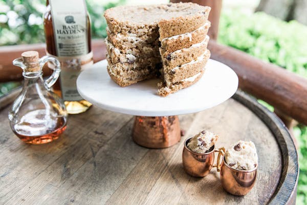 a cake sitting on top of a wooden table