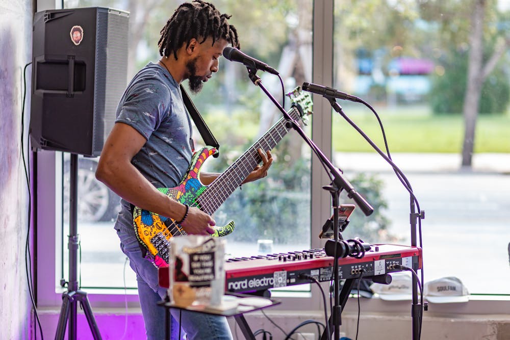 a man riding on the back of a bicycle