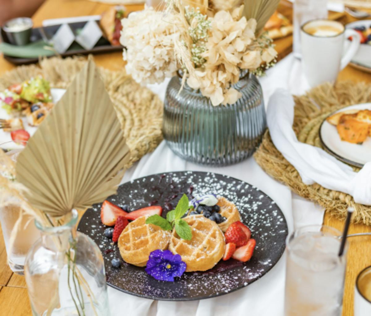 a table topped with plates of food on a plate