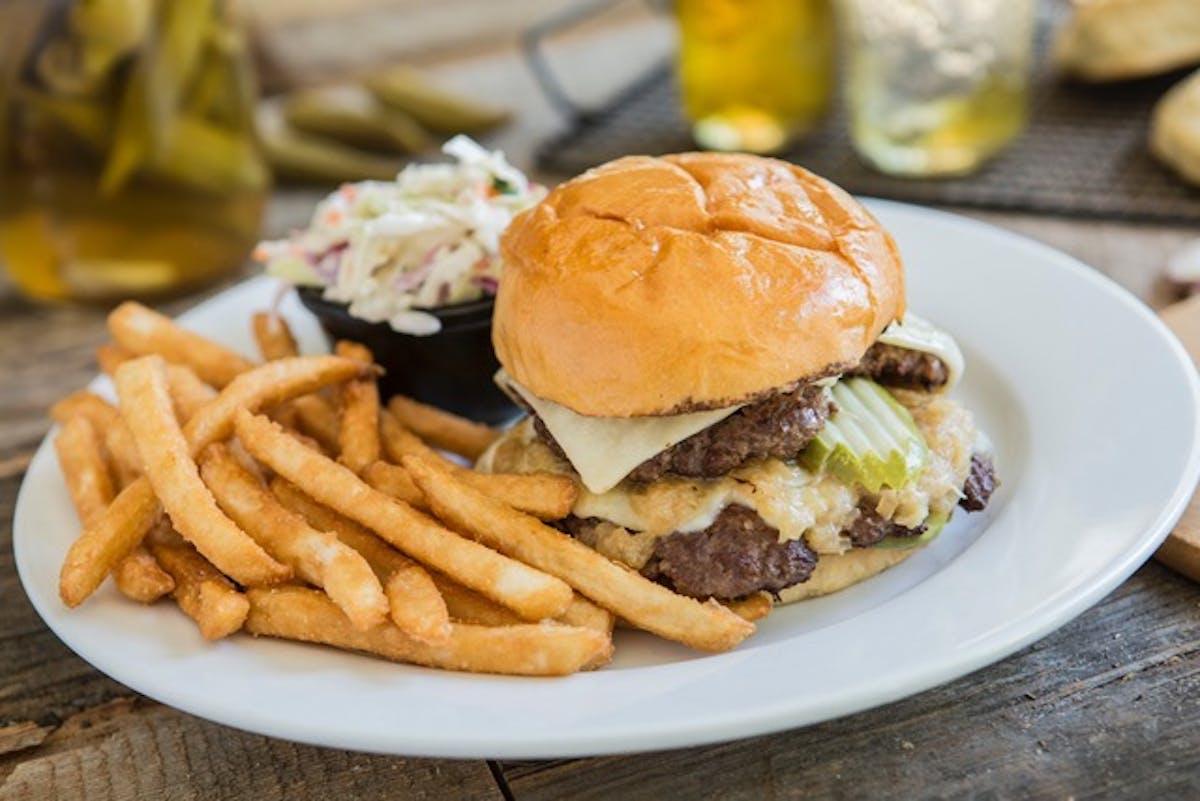 a sandwich and fries on a plate