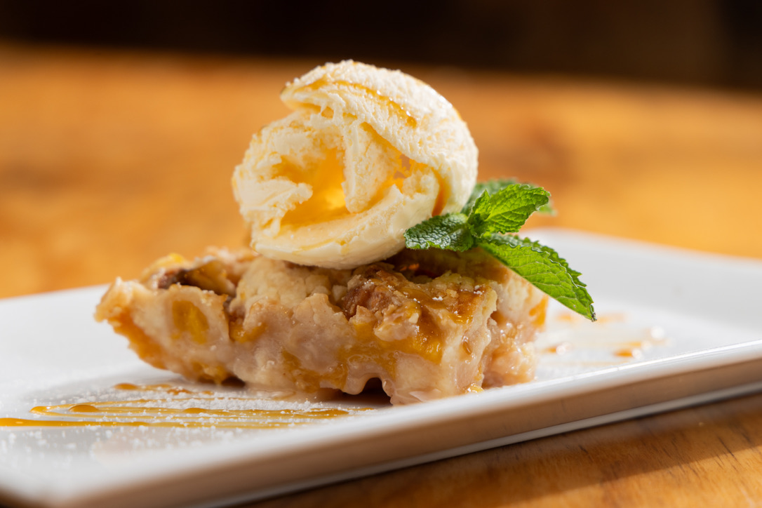 Peach Cobbler with Vanilla bean Ice Cream 