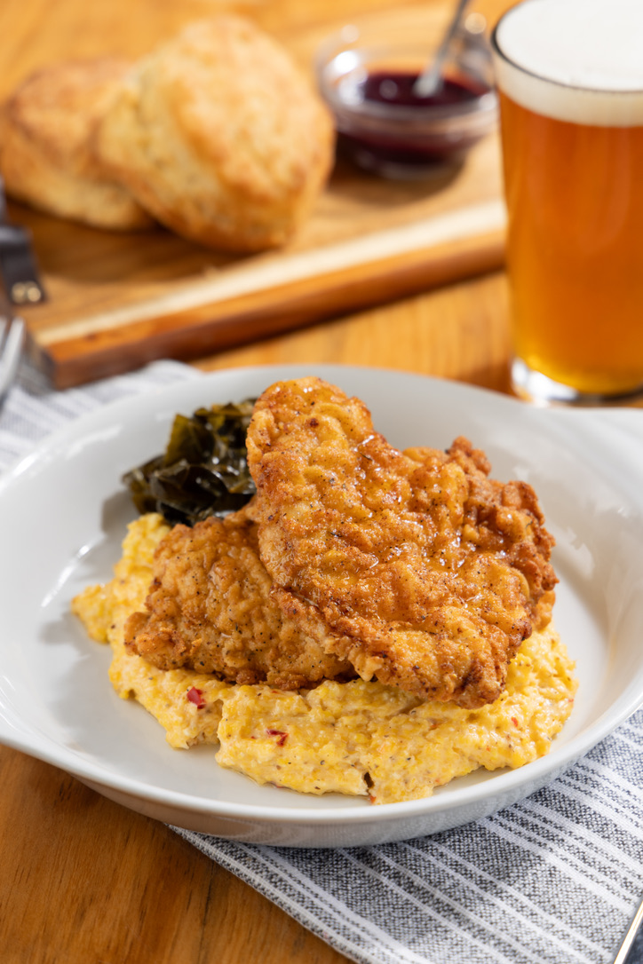 Fried Chicken on grits with sweet tea collards 