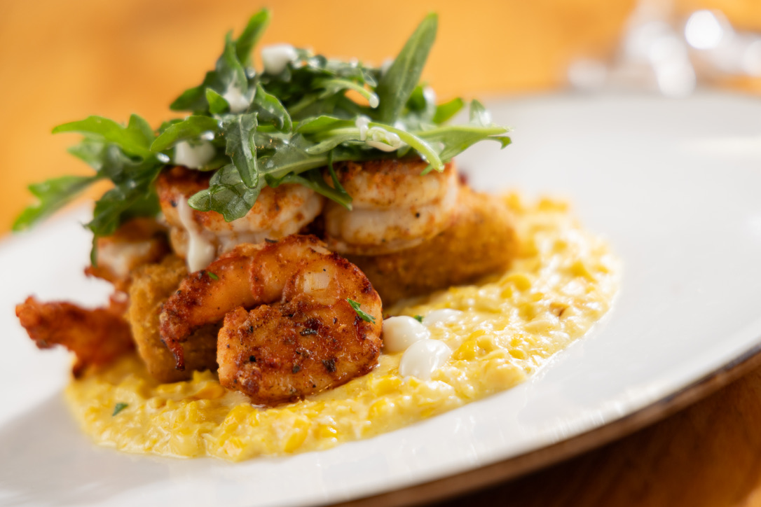 Arrogantly Shabby Shrimp, grit cake and creamed corn 