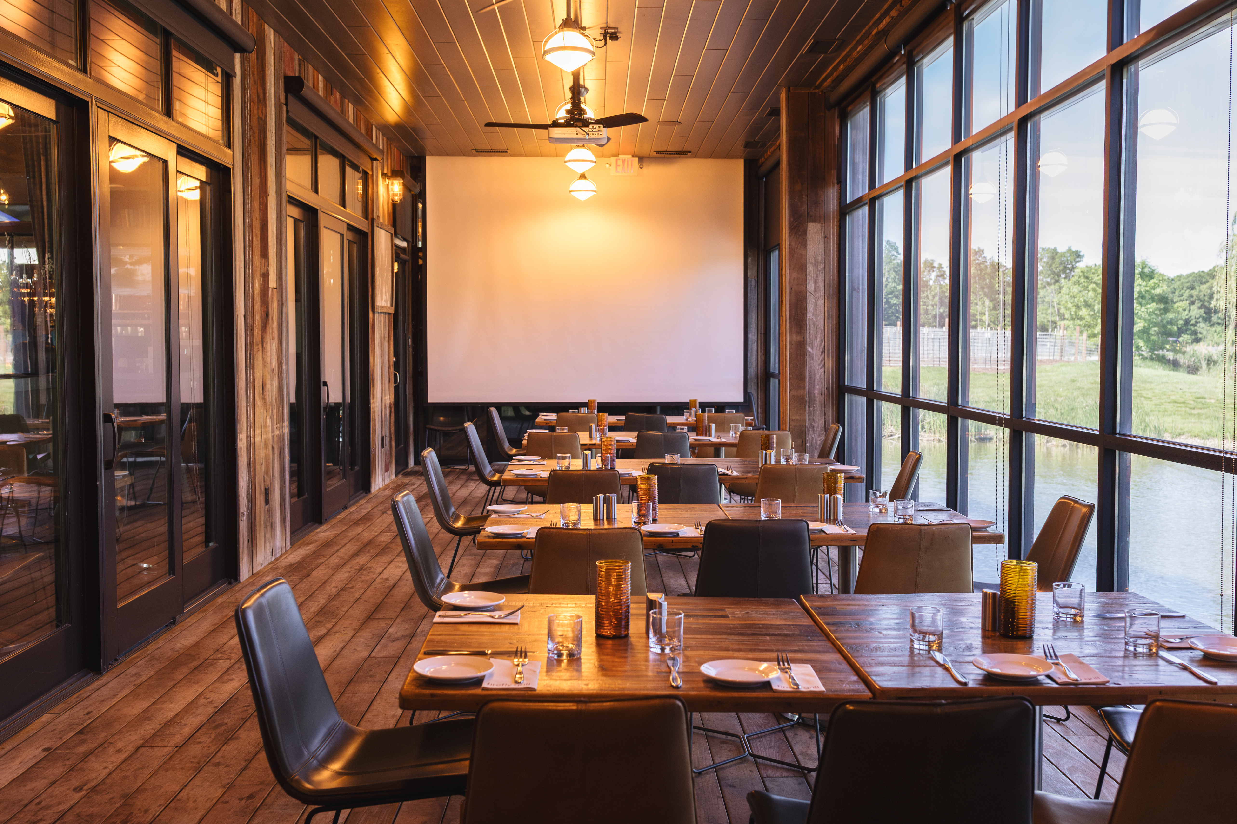 a room with tables and chairs