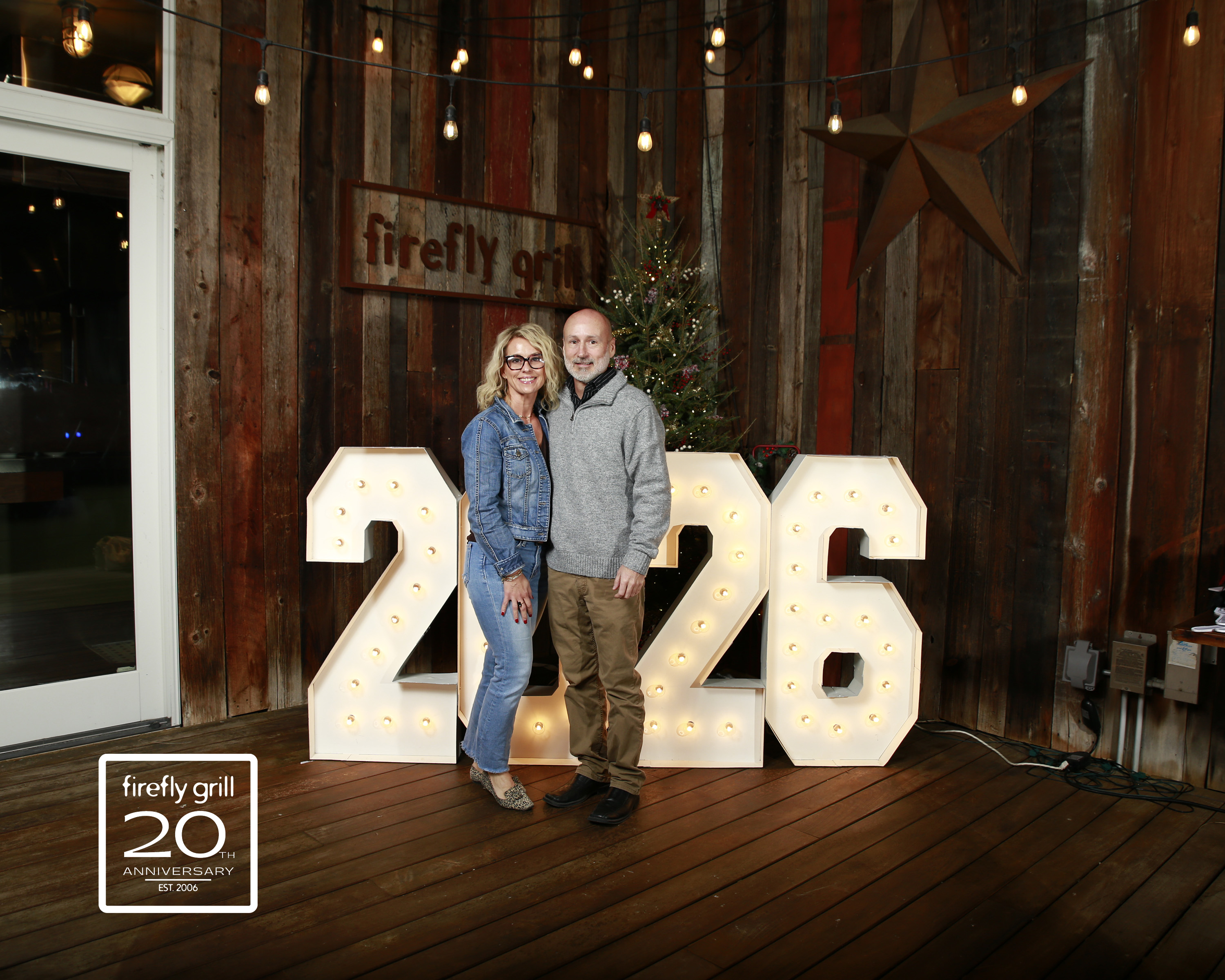 a person holding a sign in front of a building