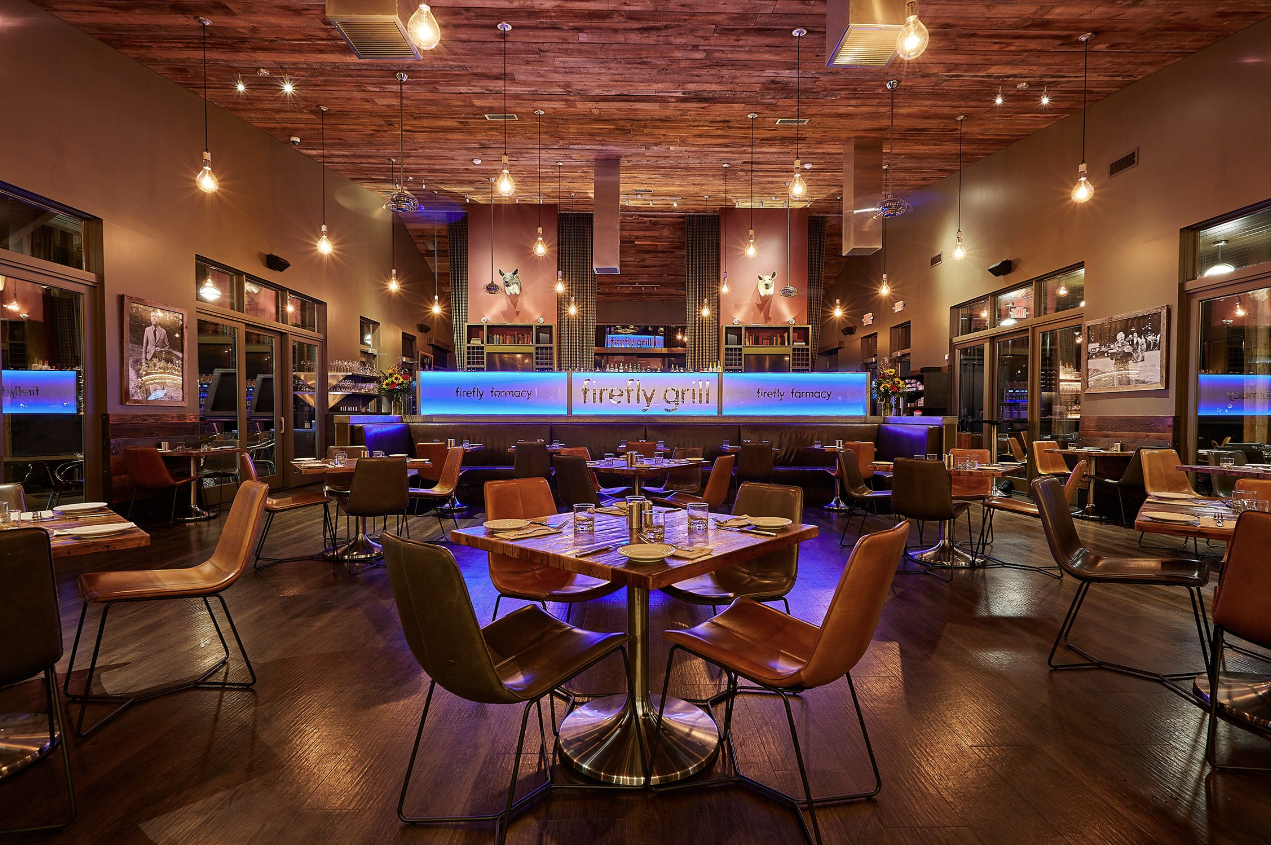 a restaurant with tables and chairs