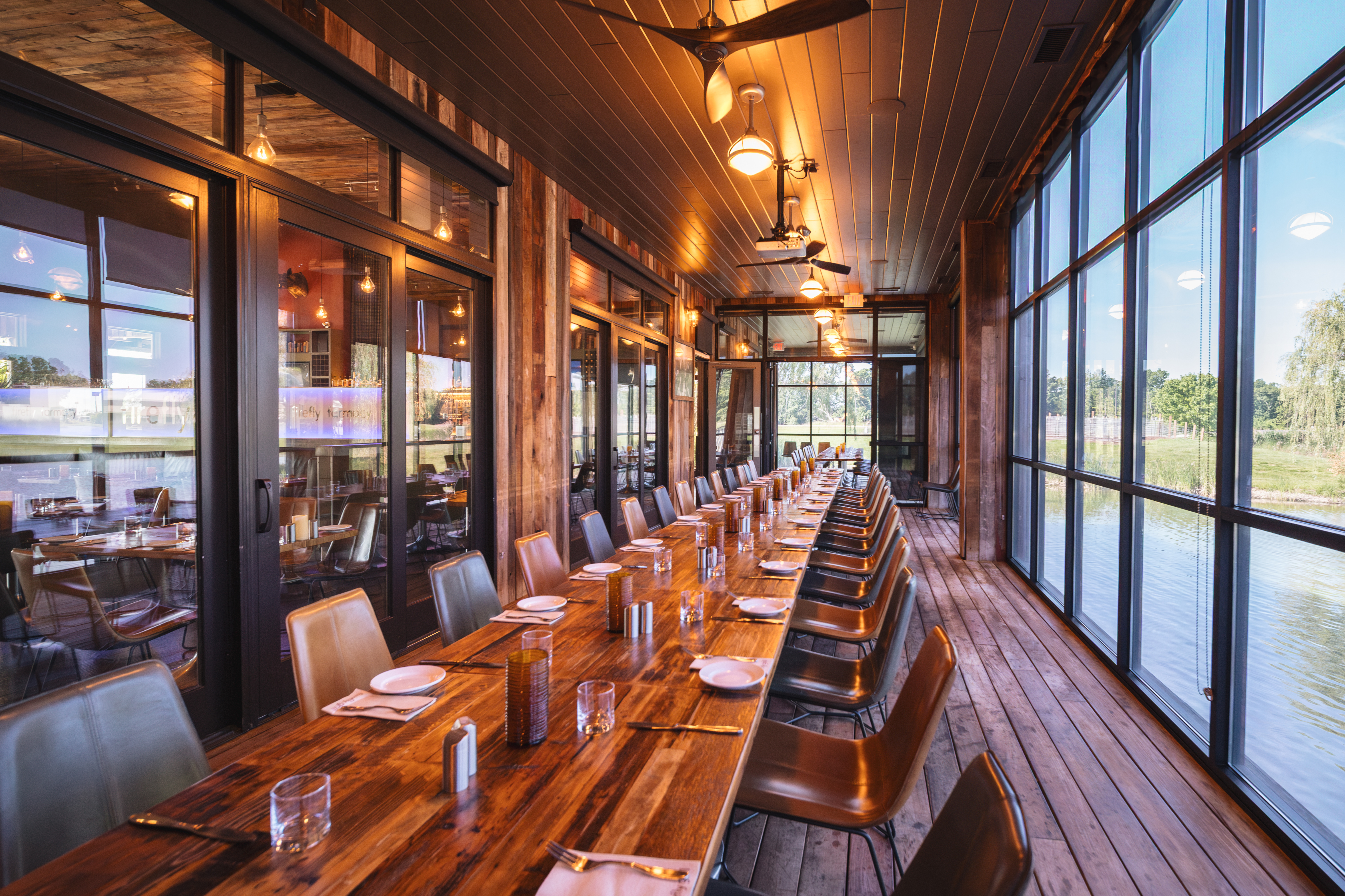 a dining room table in front of a window