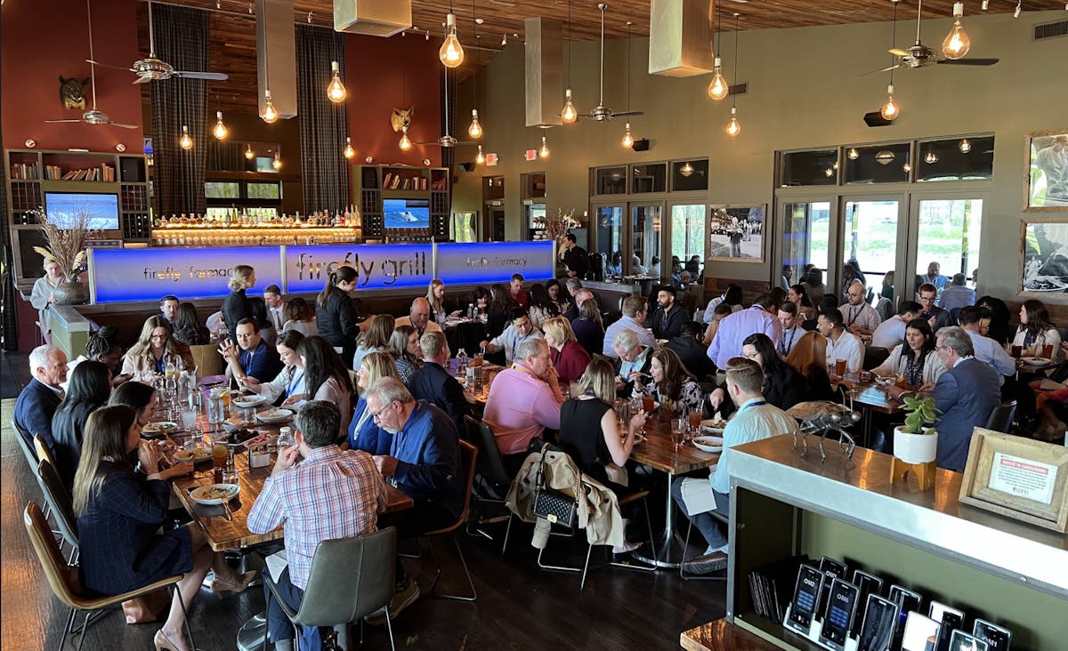 A Group of Guests Enjoy Lunch in The Main Dining