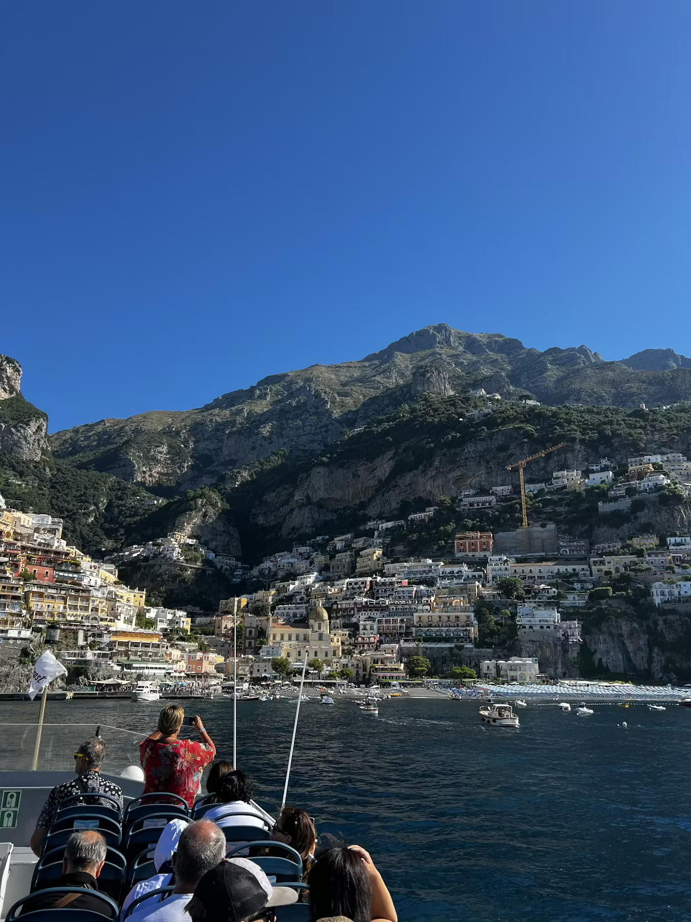 a group of people riding on top of a mountain