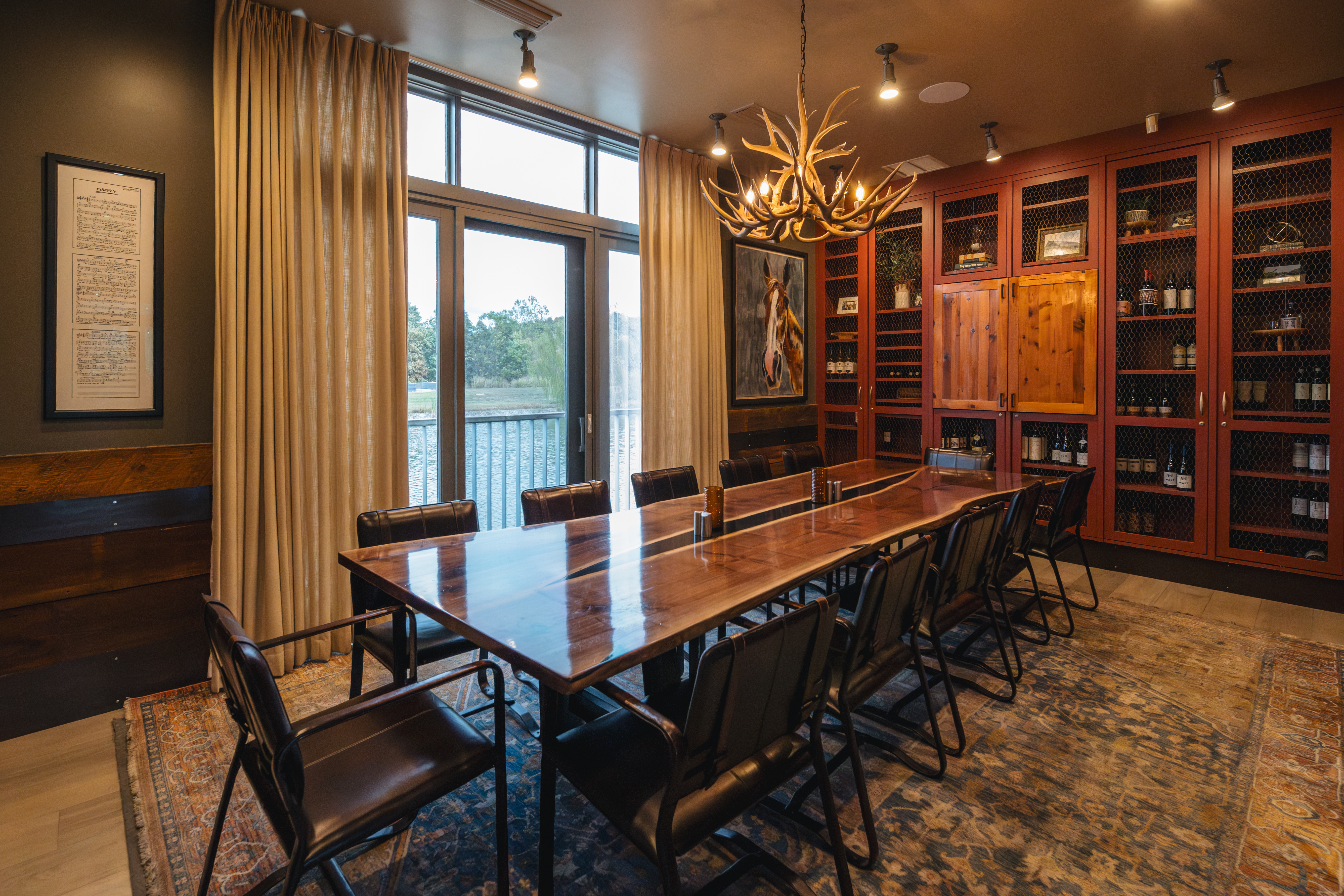 a dining room table in front of a window