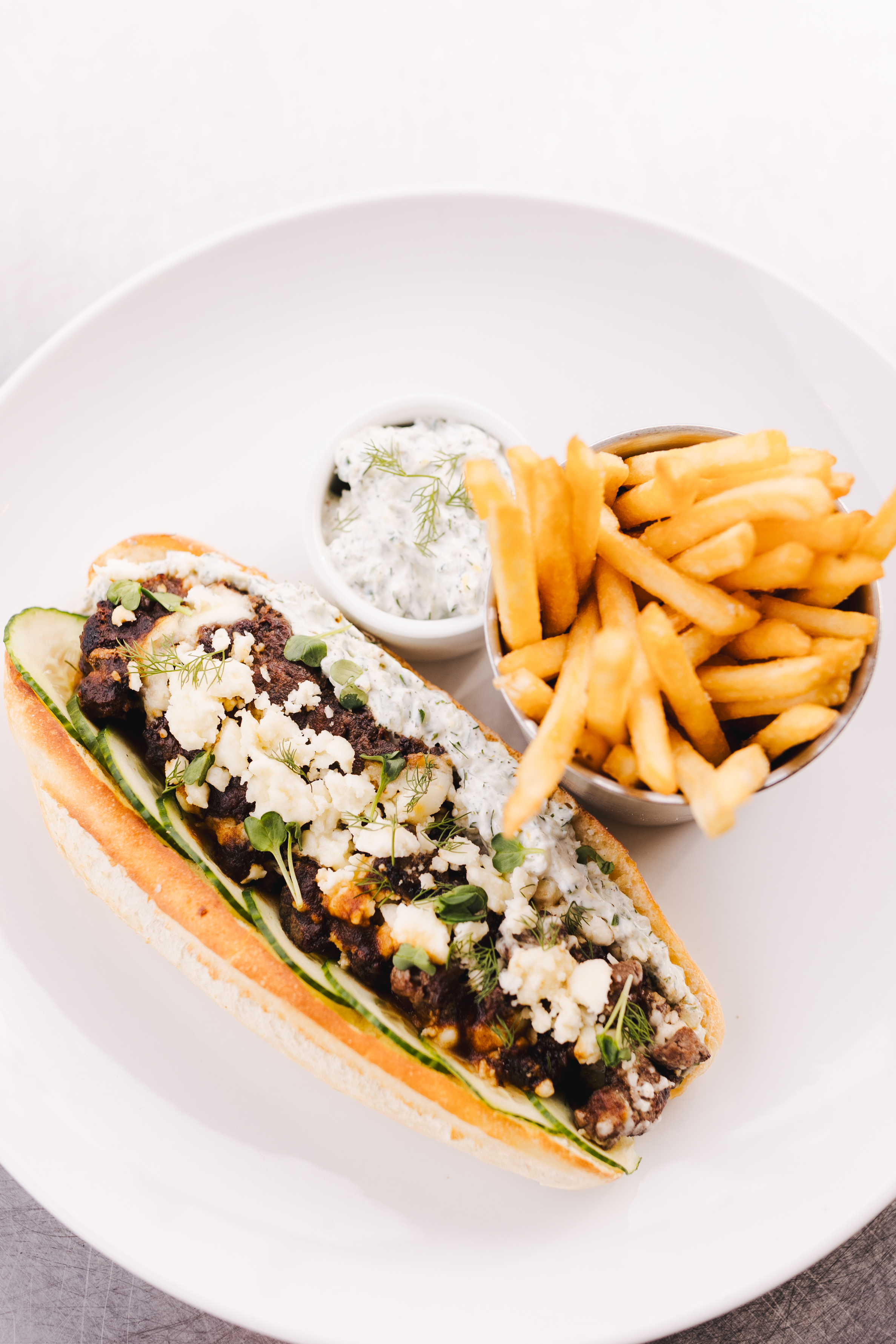 a sandwich and french fries on a plate