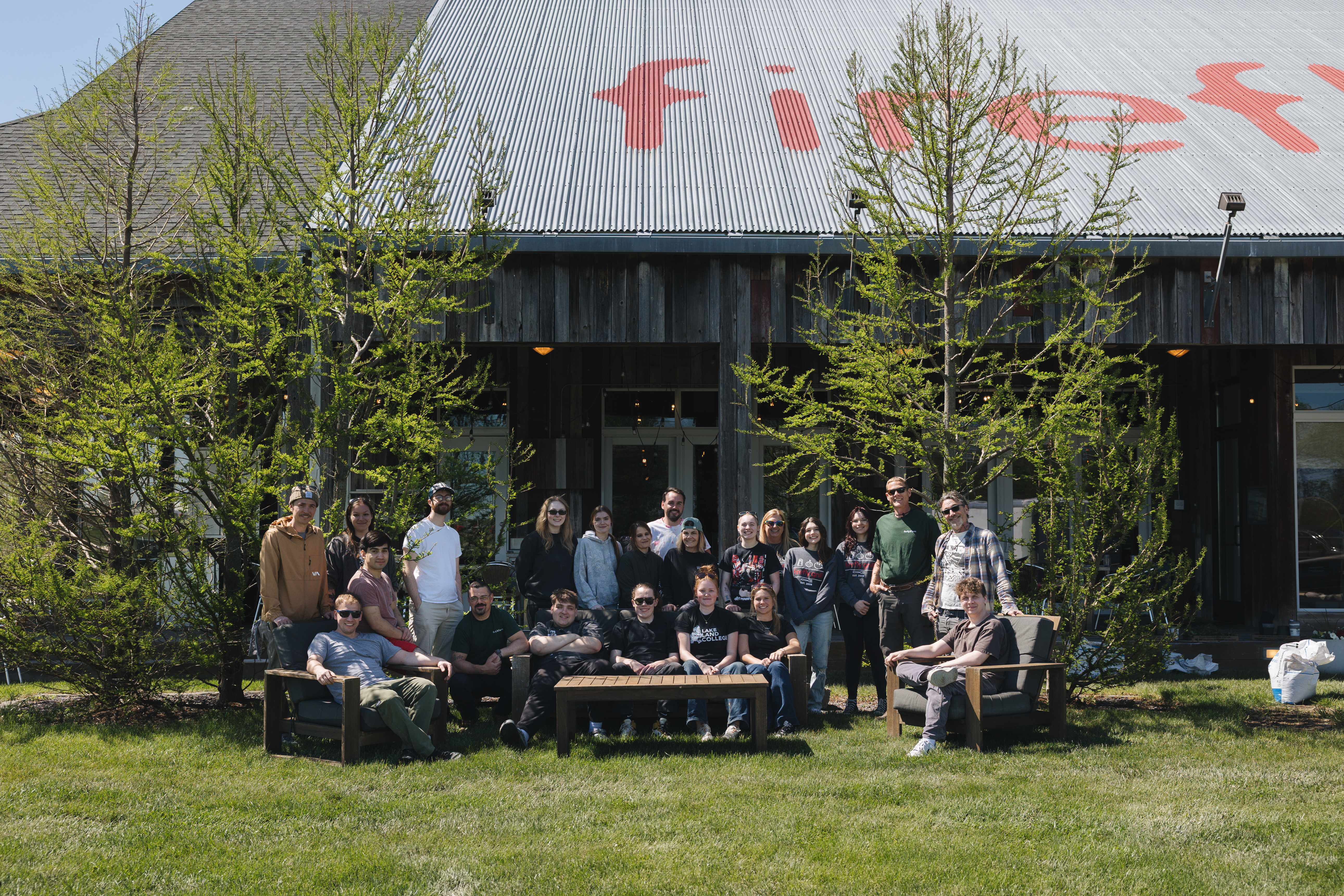 74.jpg	The Firefly Grill team gathered together in front of the restaurant to kick off Farm Day