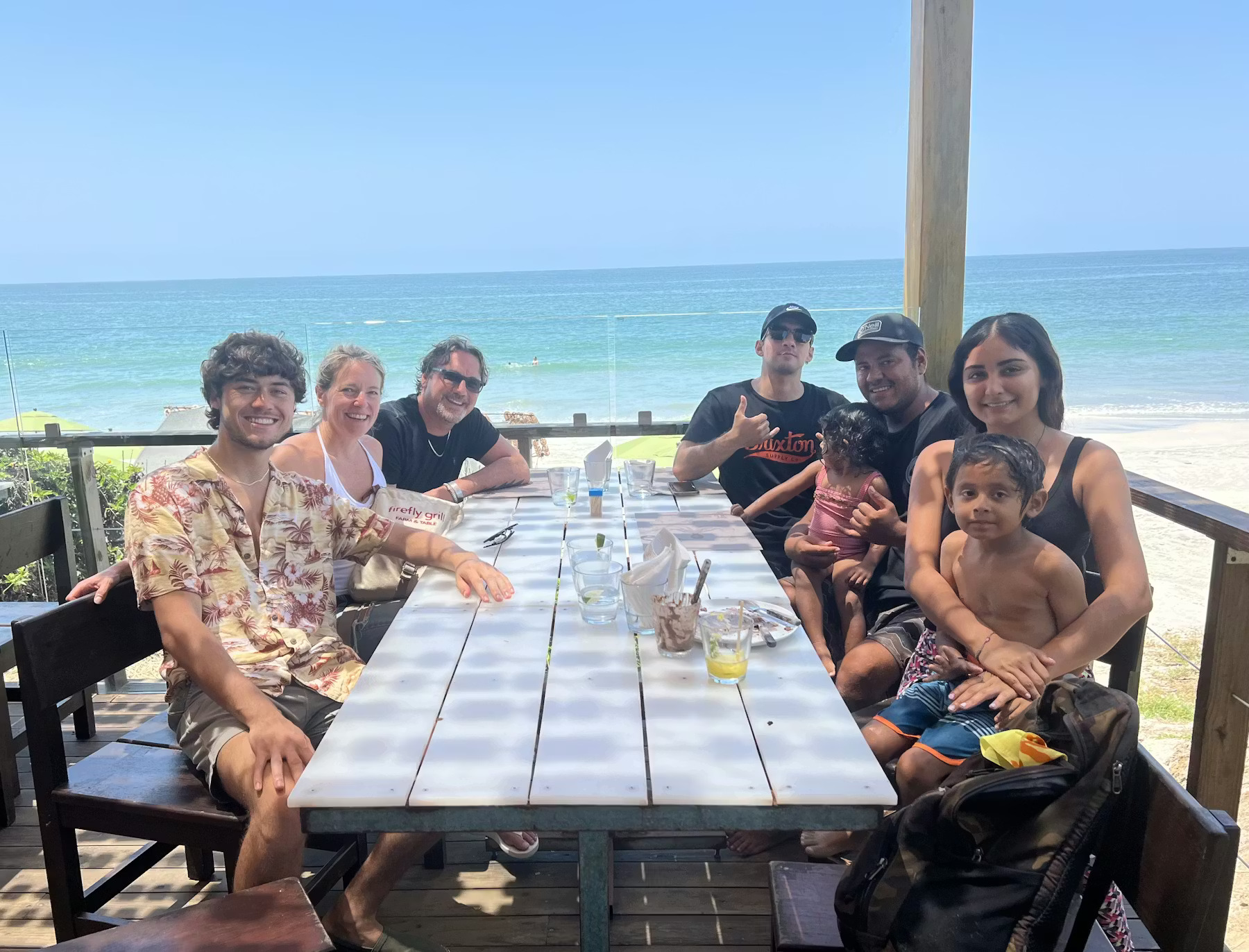 Tristan Walker, Shelli Johnson sitting at a dock