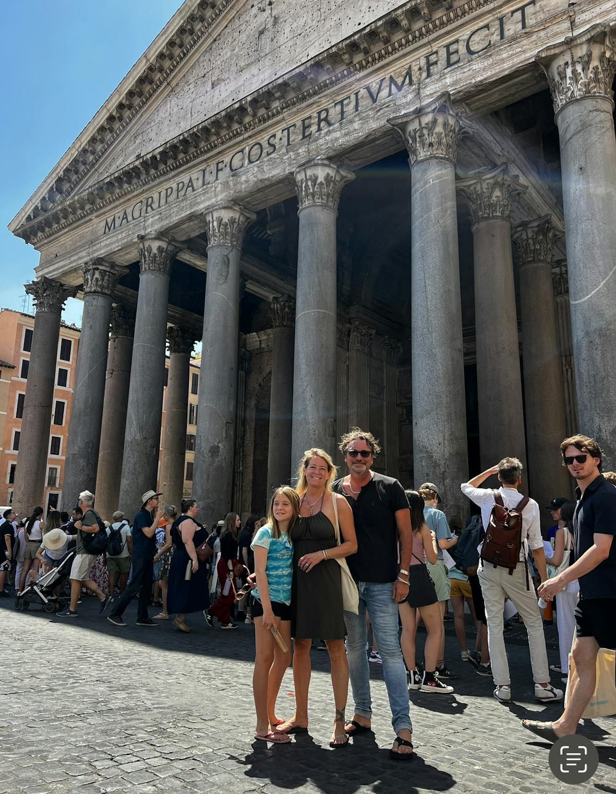 a group of people standing in front of Pantheon, Rome