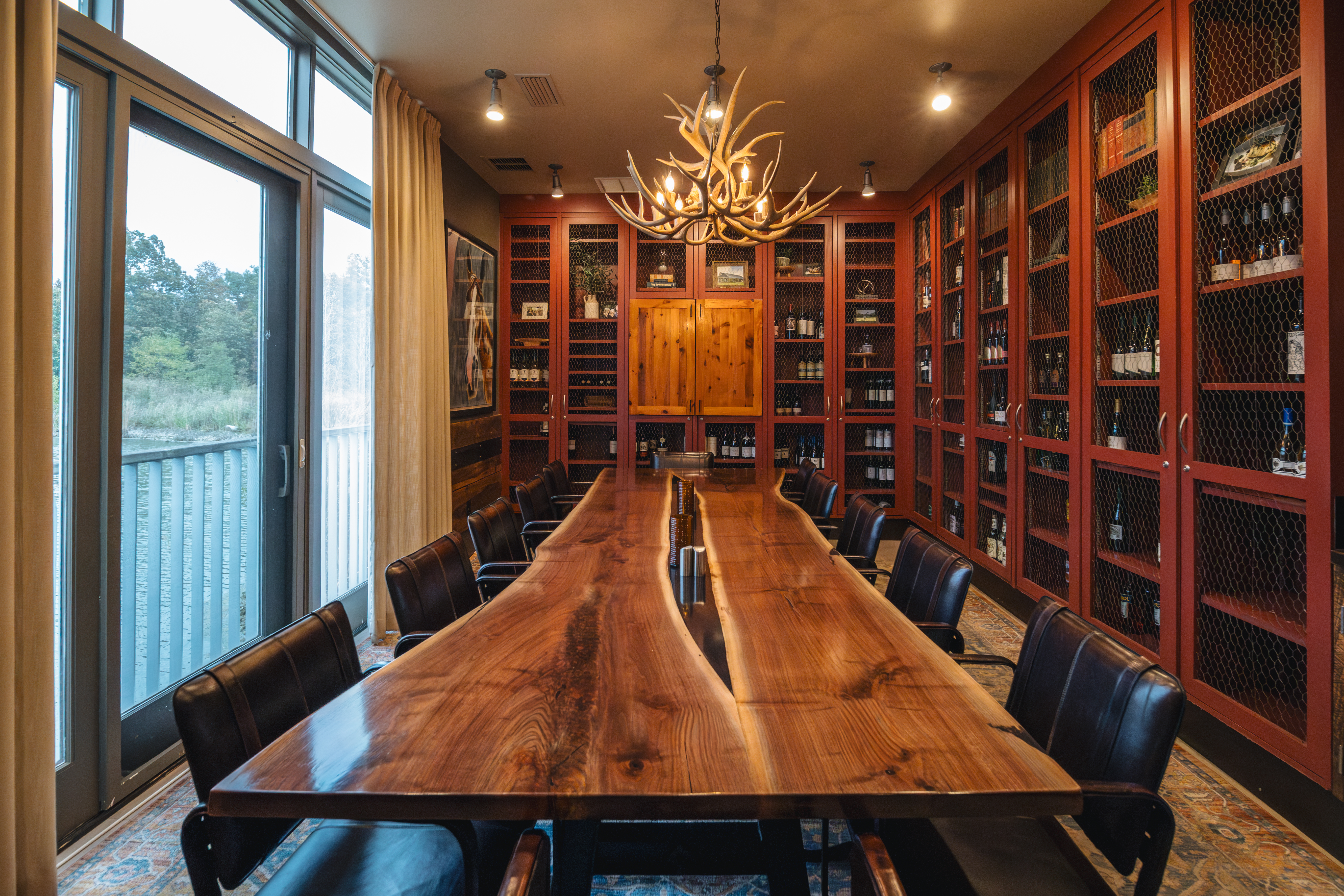 a dining room table in front of a window