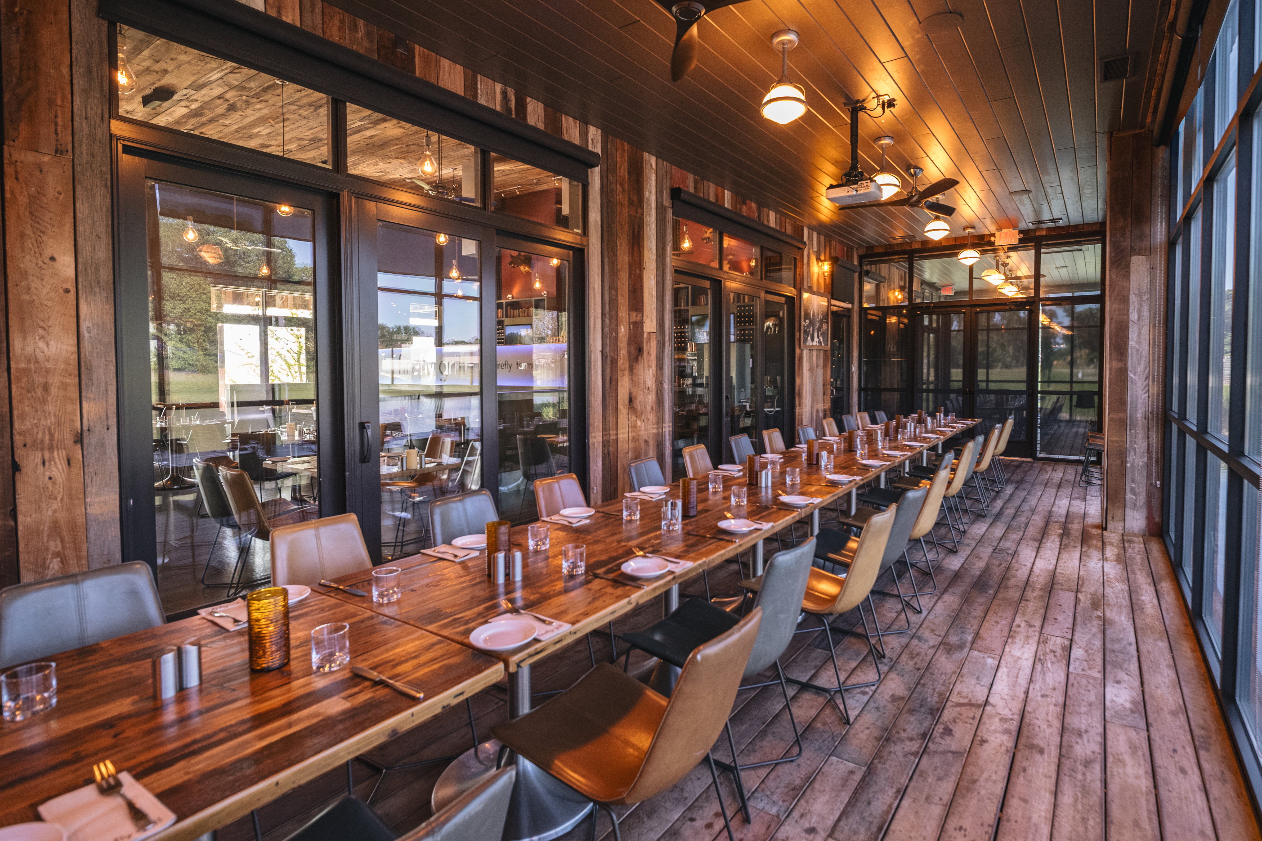 a room with tables and chairs