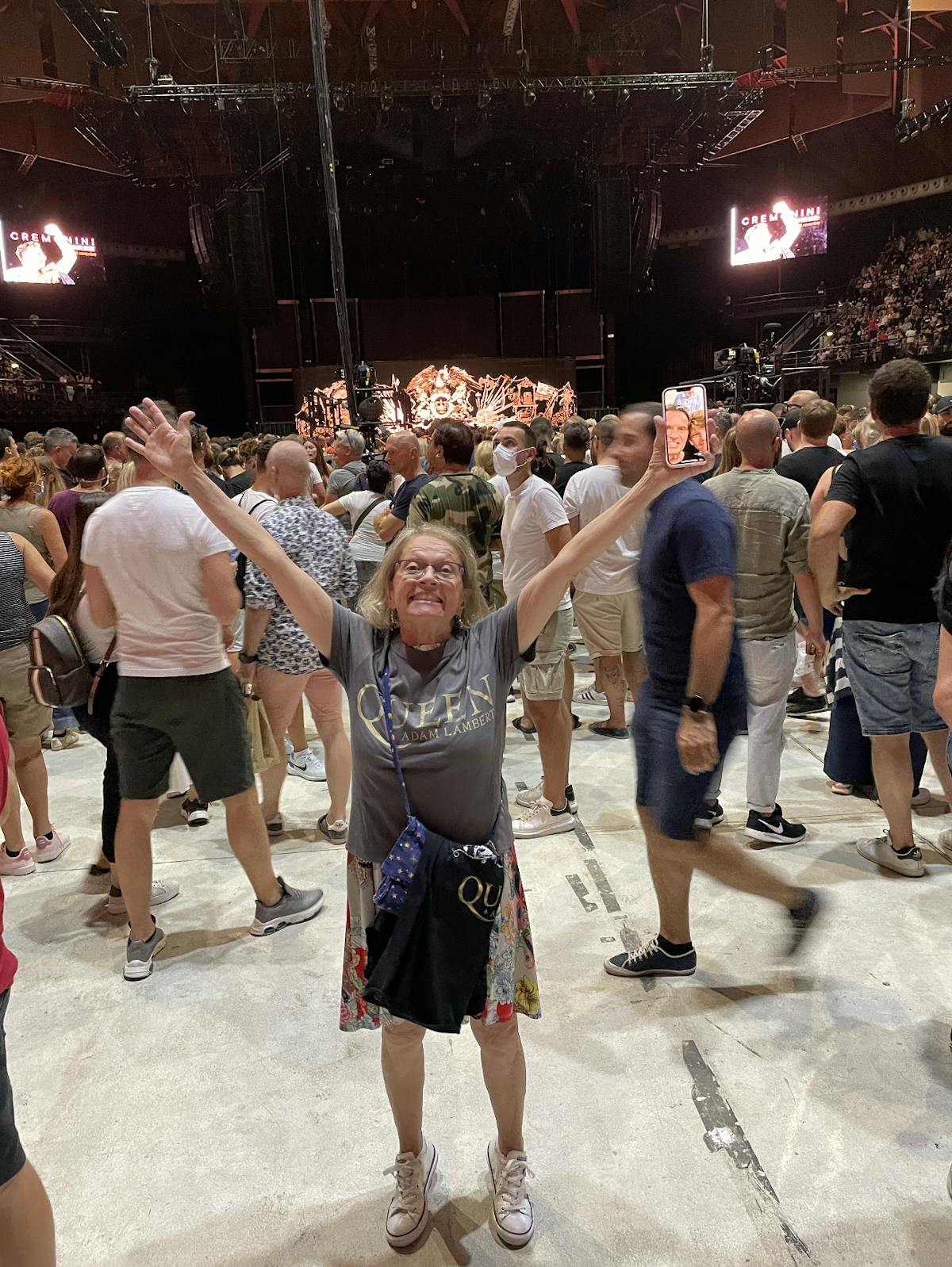 a group of people standing in front of a crowd