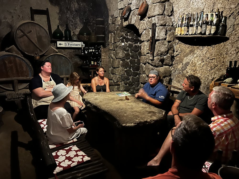 a group of people sitting at a table