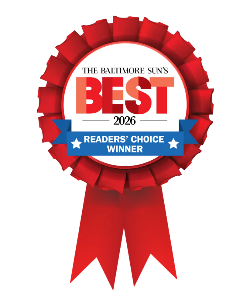 a red ribbon with blue and white text
