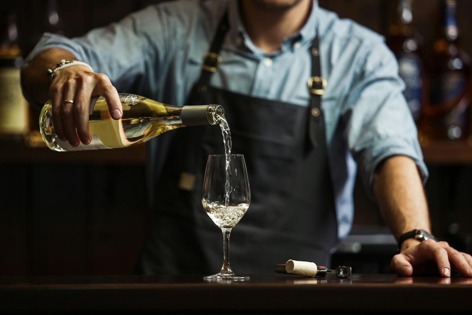 a man holding a glass of wine