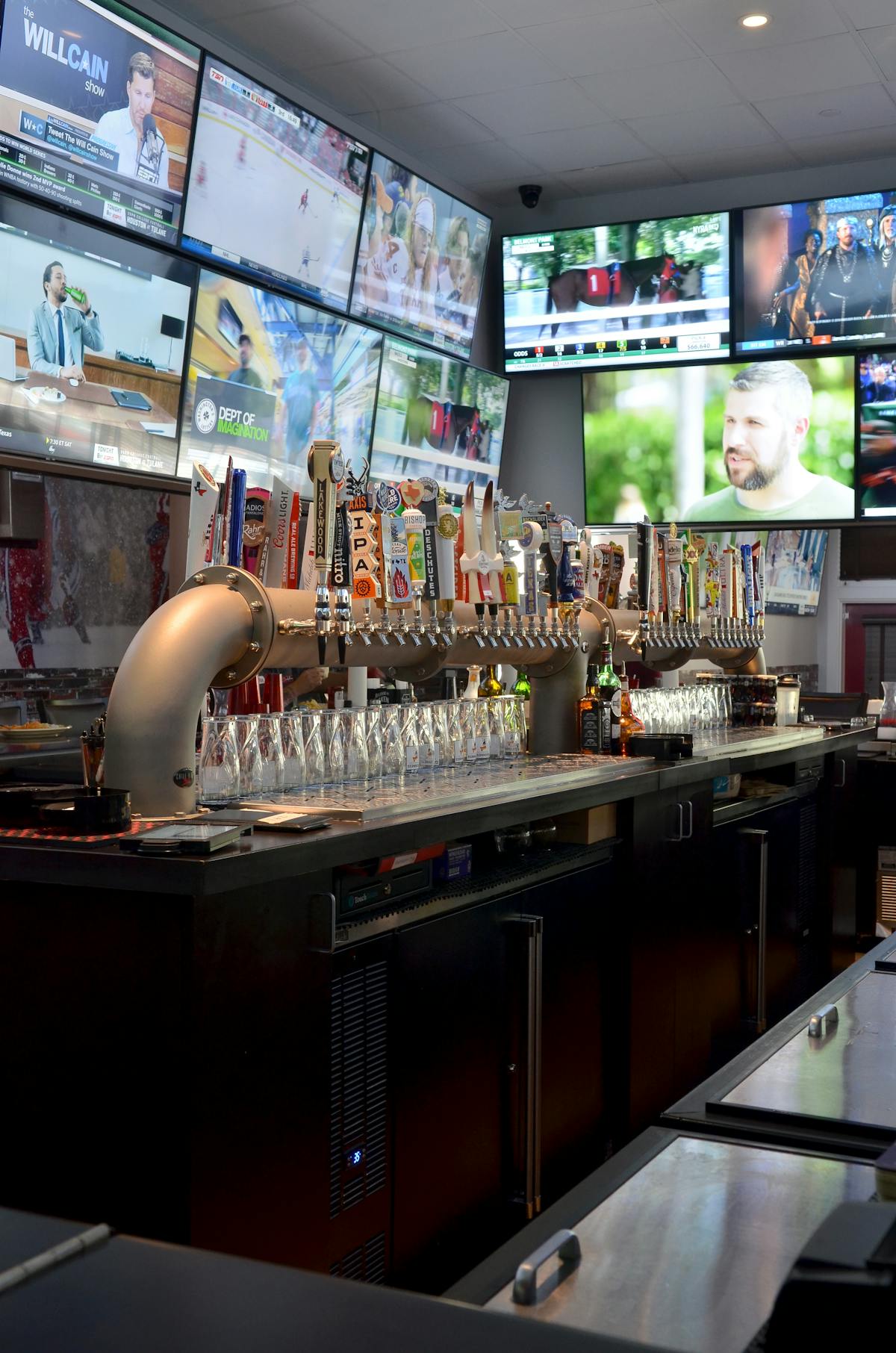 a group of people in a kitchen