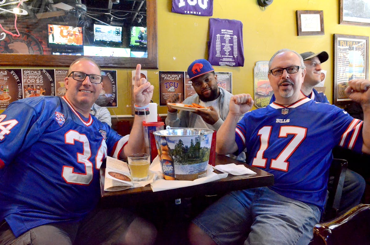 a group of people sitting at a table