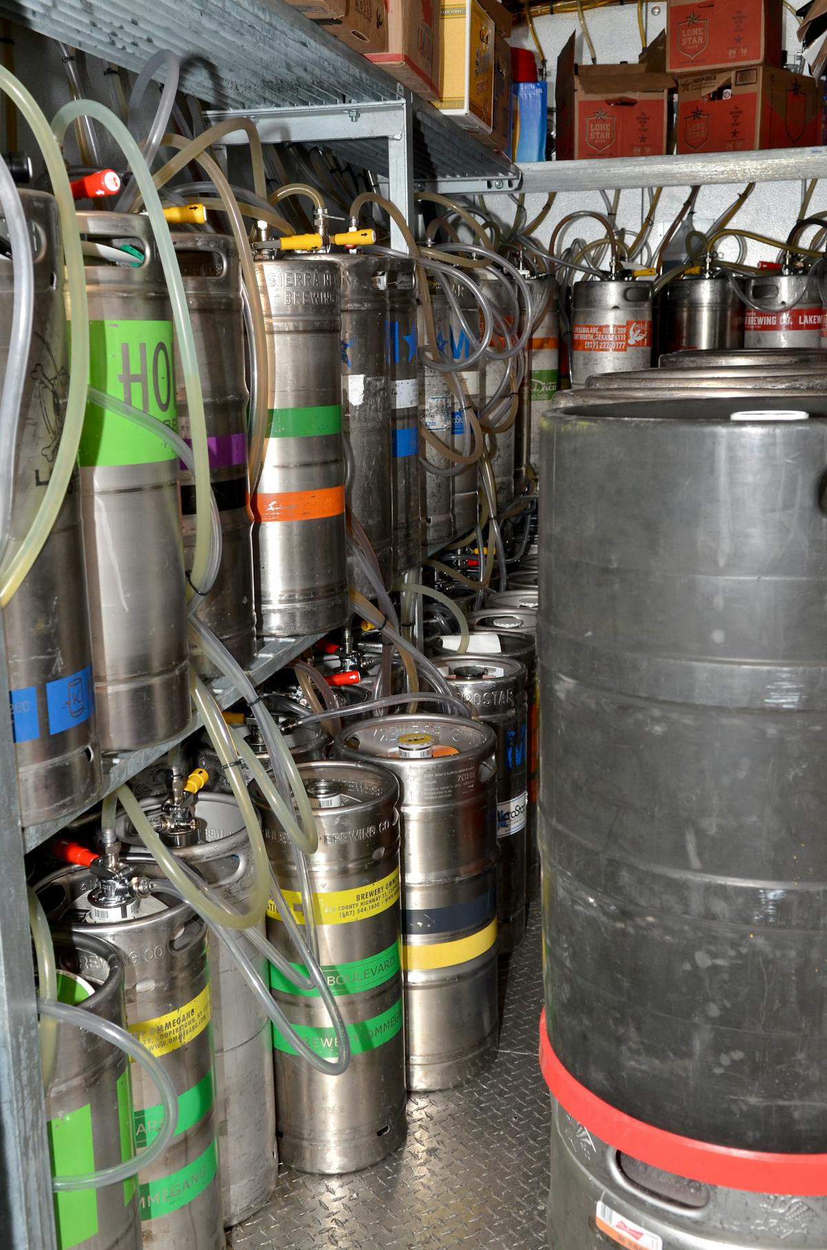 a large commercial kitchen with stainless steel appliances