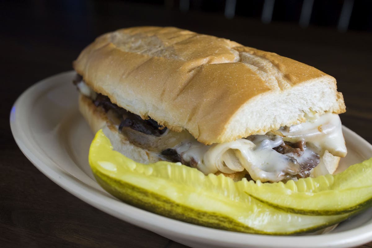 a sandwich cut in half on a plate