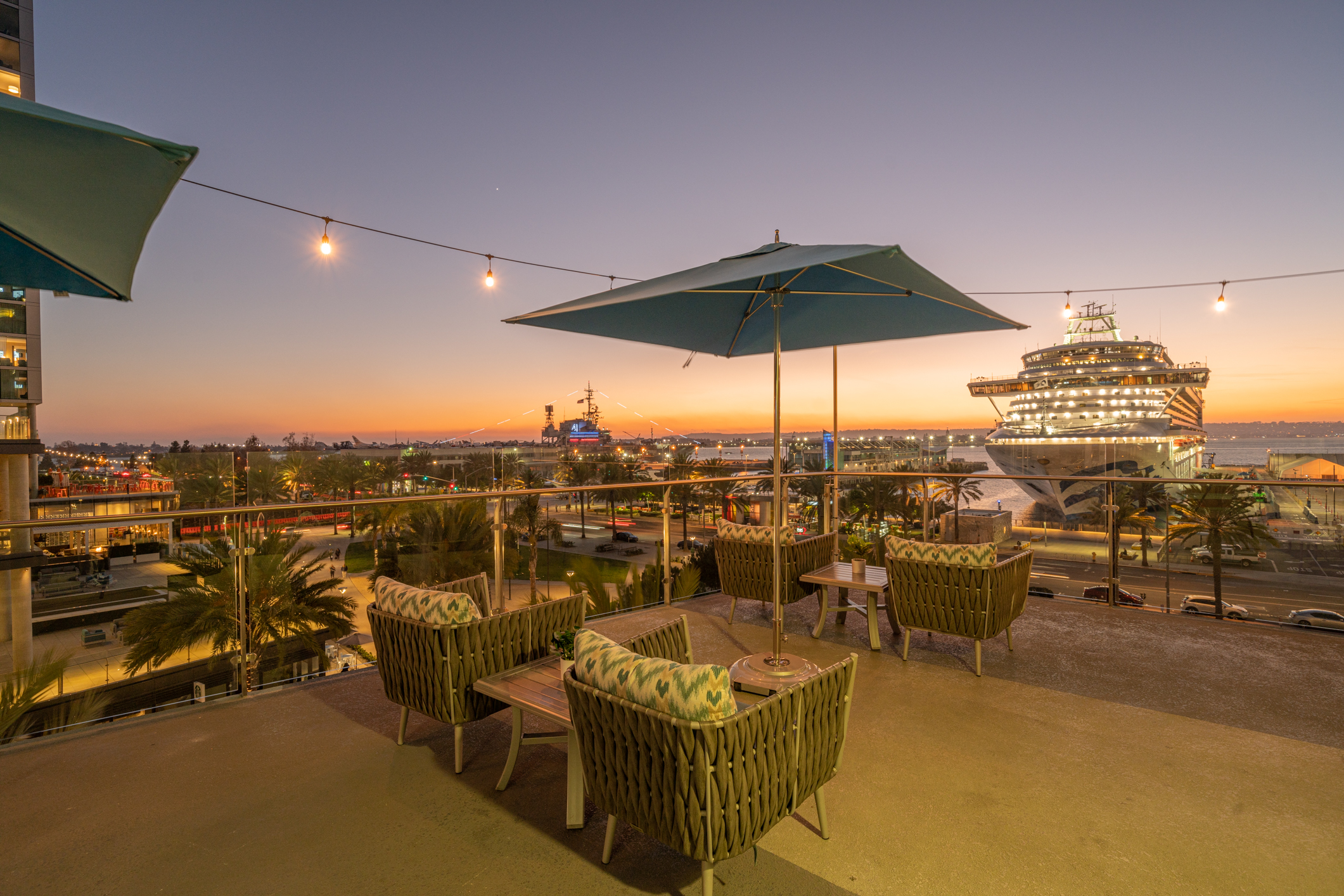 a table topped with a blue umbrella