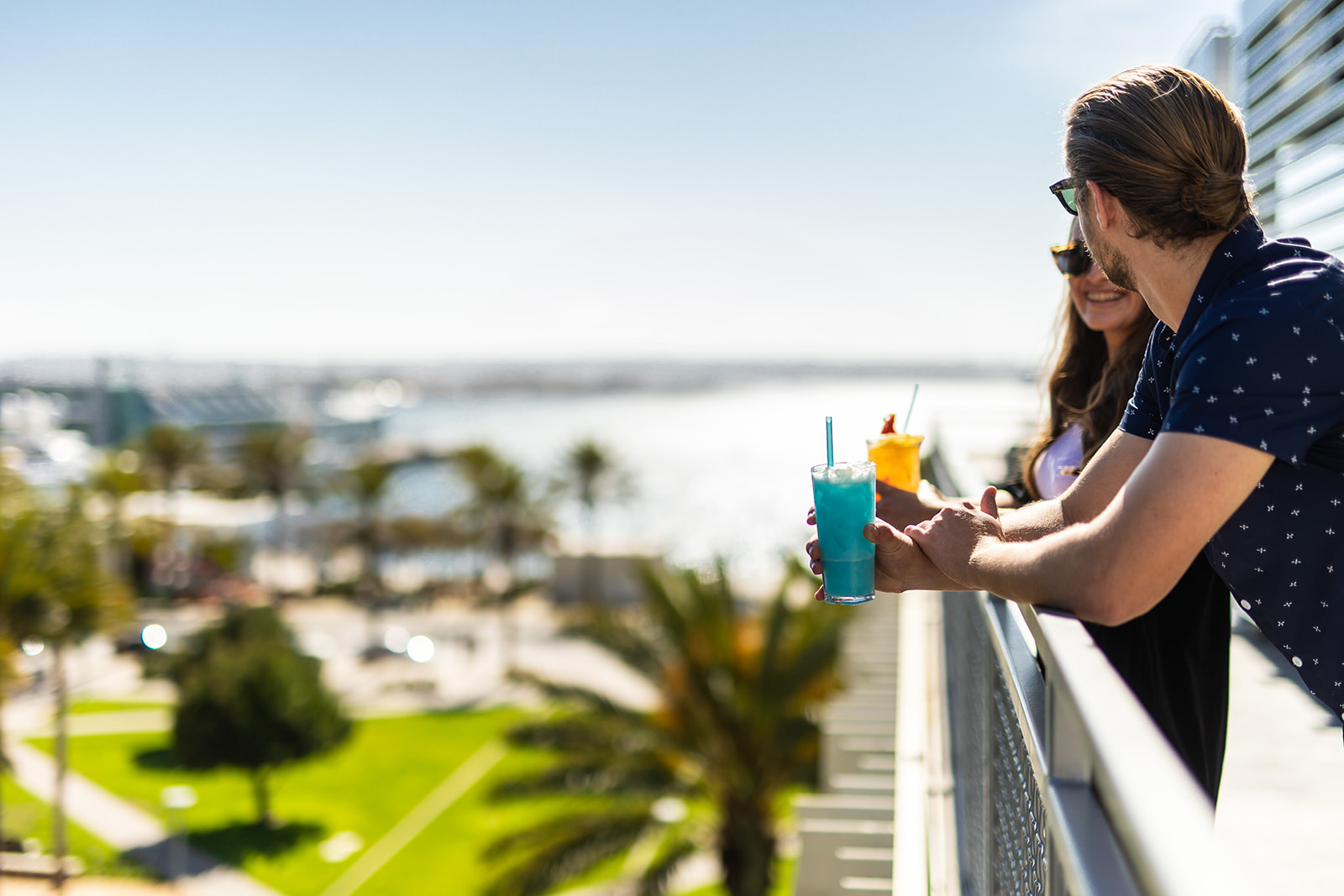 people looking off the rooftop