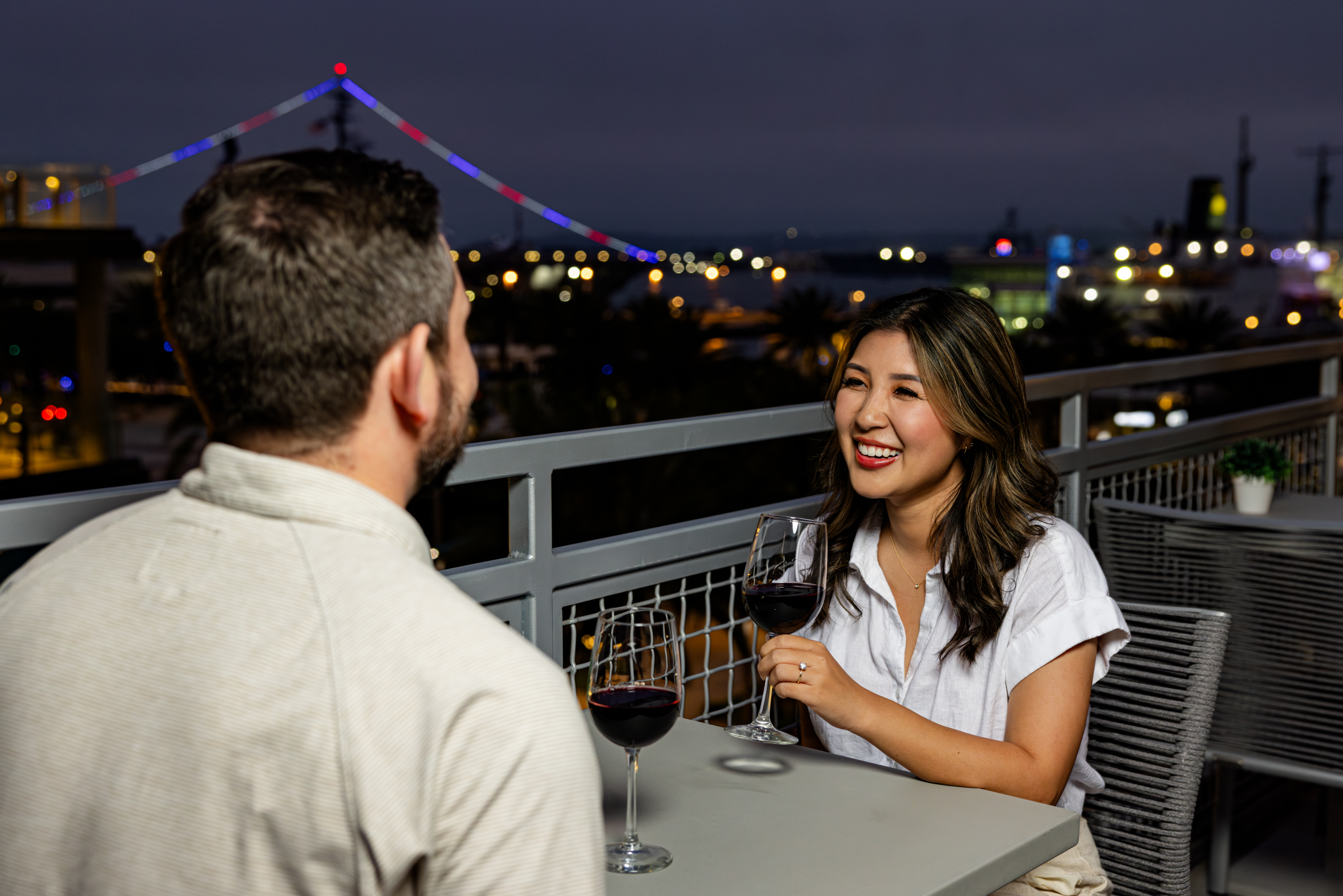 a man and a woman looking at the camera