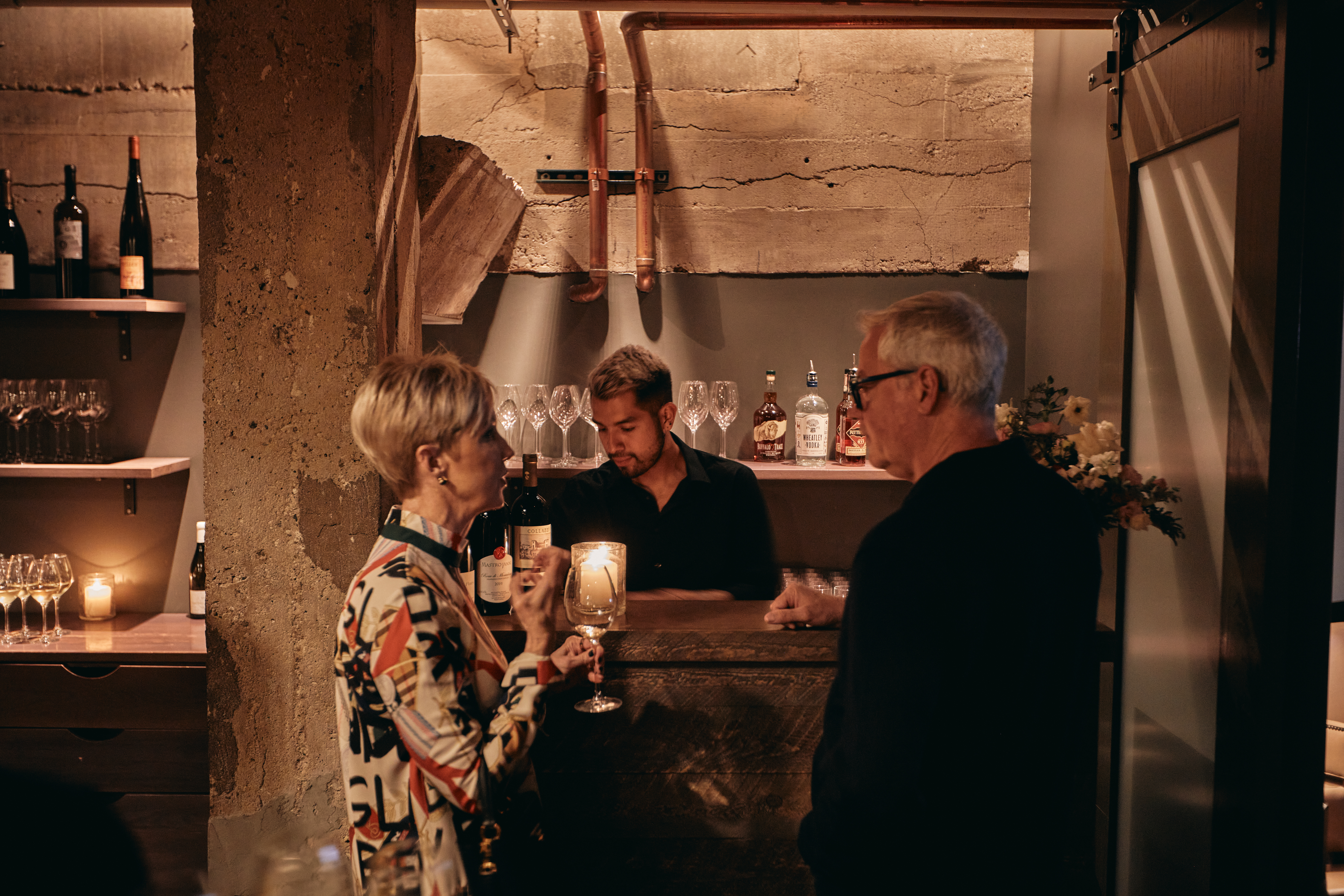 people at a room with drinks