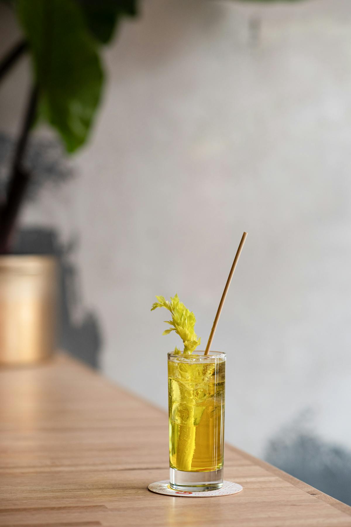 a close up of a drink on a bar