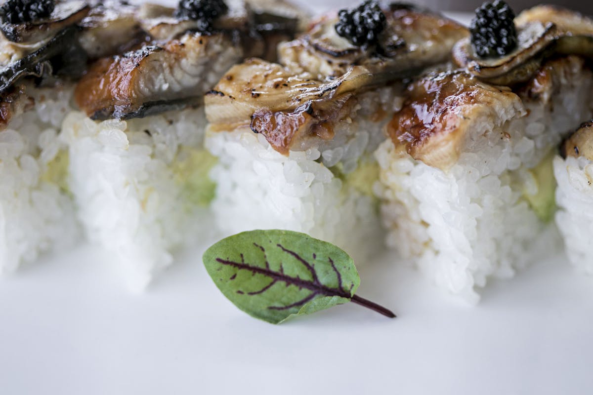 a plate of food with rice and vegetables