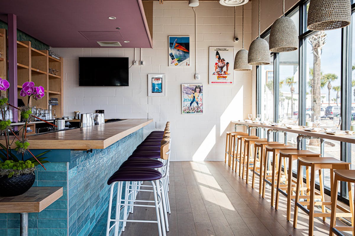 a kitchen with a dining table