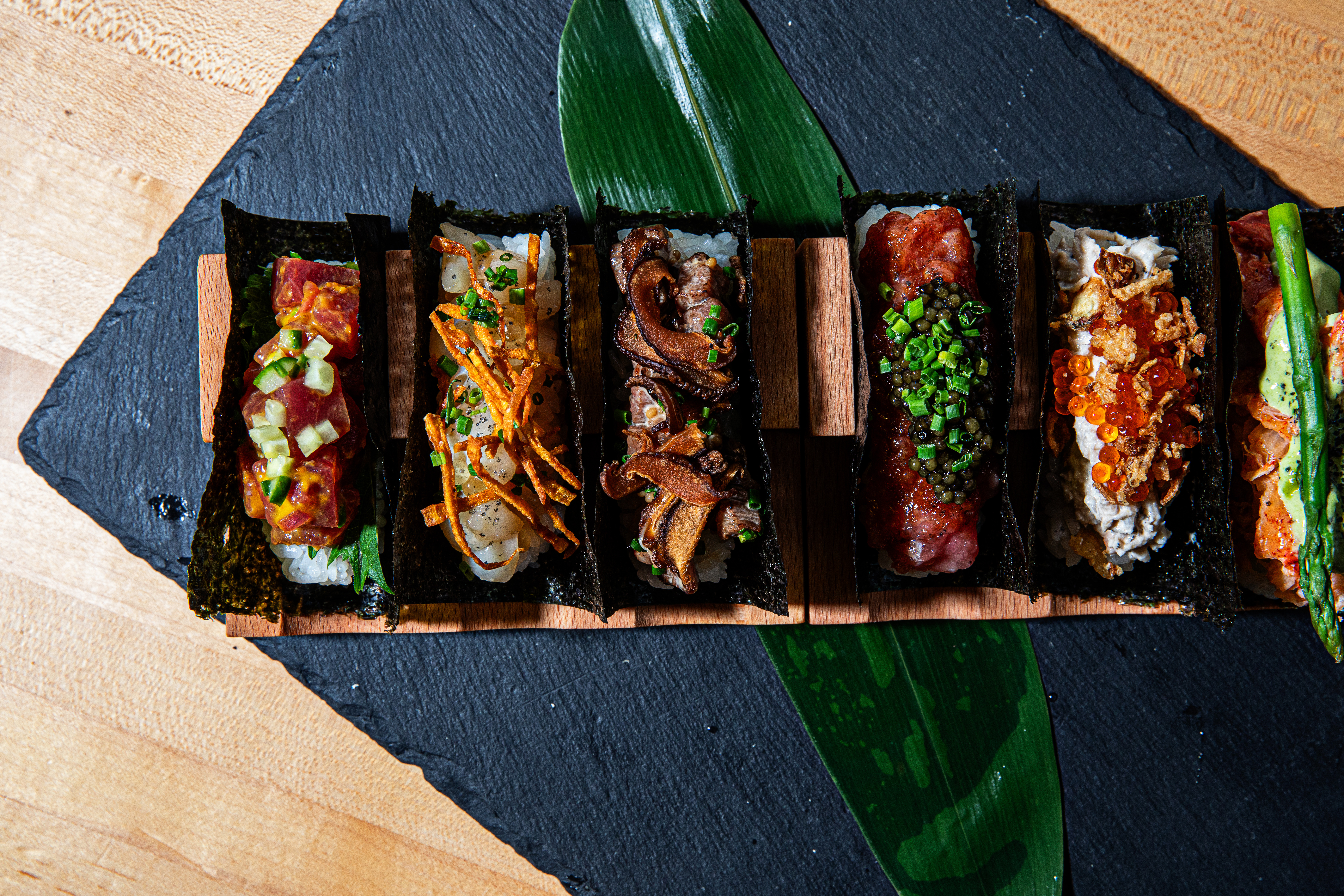 a table topped with a green umbrella